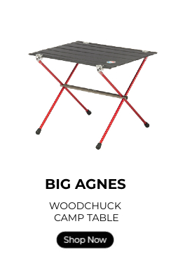 Big Agnes Woodchuck camp table with a shop now button.