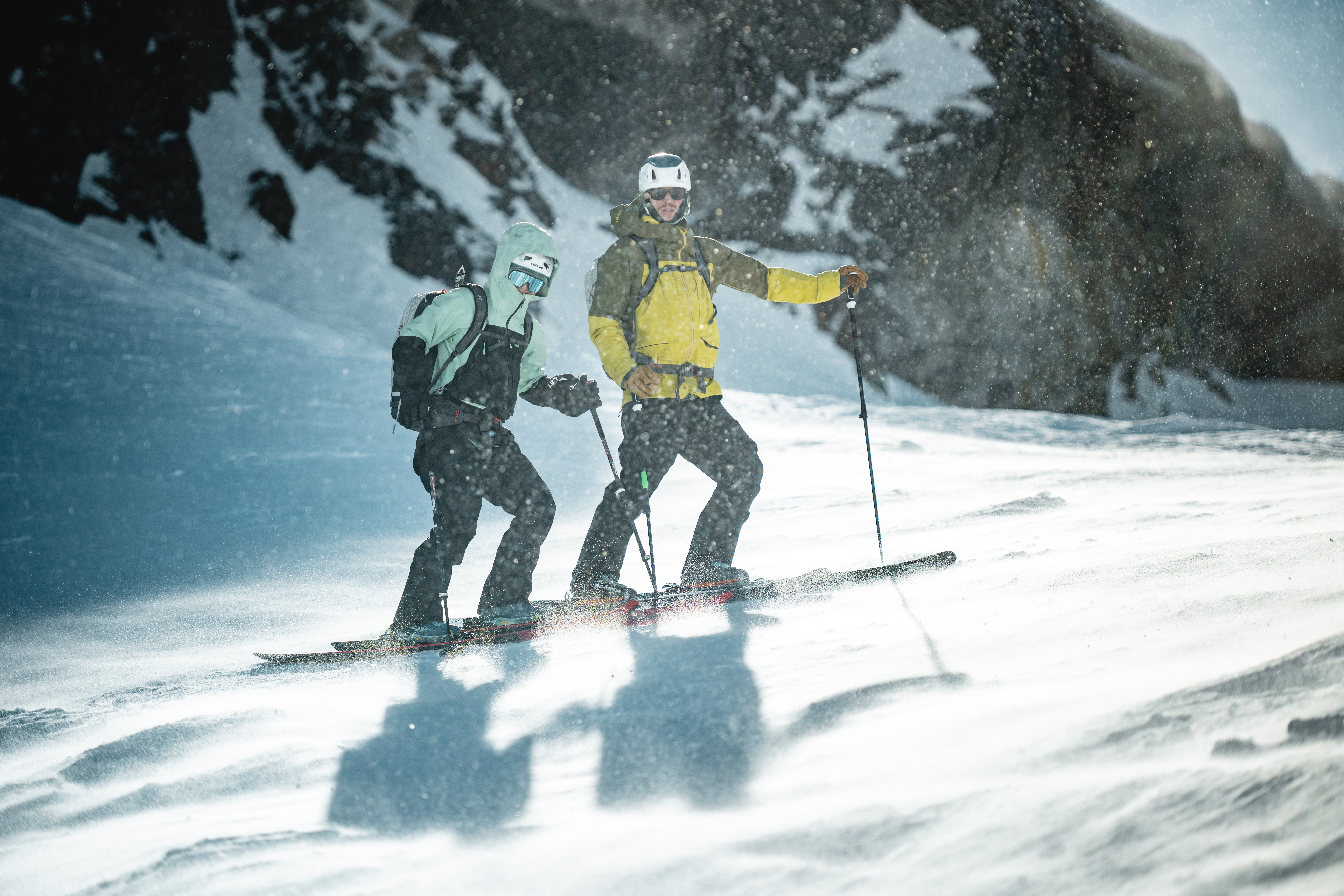 Skier wearing the Rab Khroma Converge Gore-Tex Ski Jacket in deep powder