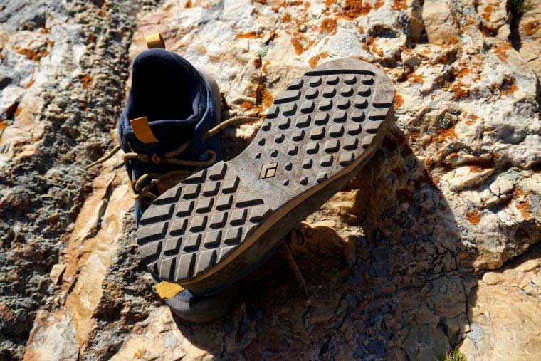 Black Diamond Mission LT Approach Shoes on a rock featuring the BlackLabel Rubber outsole.