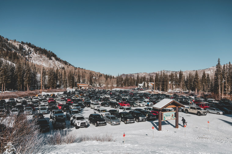 Ski area parking lot with cars packed in tightly