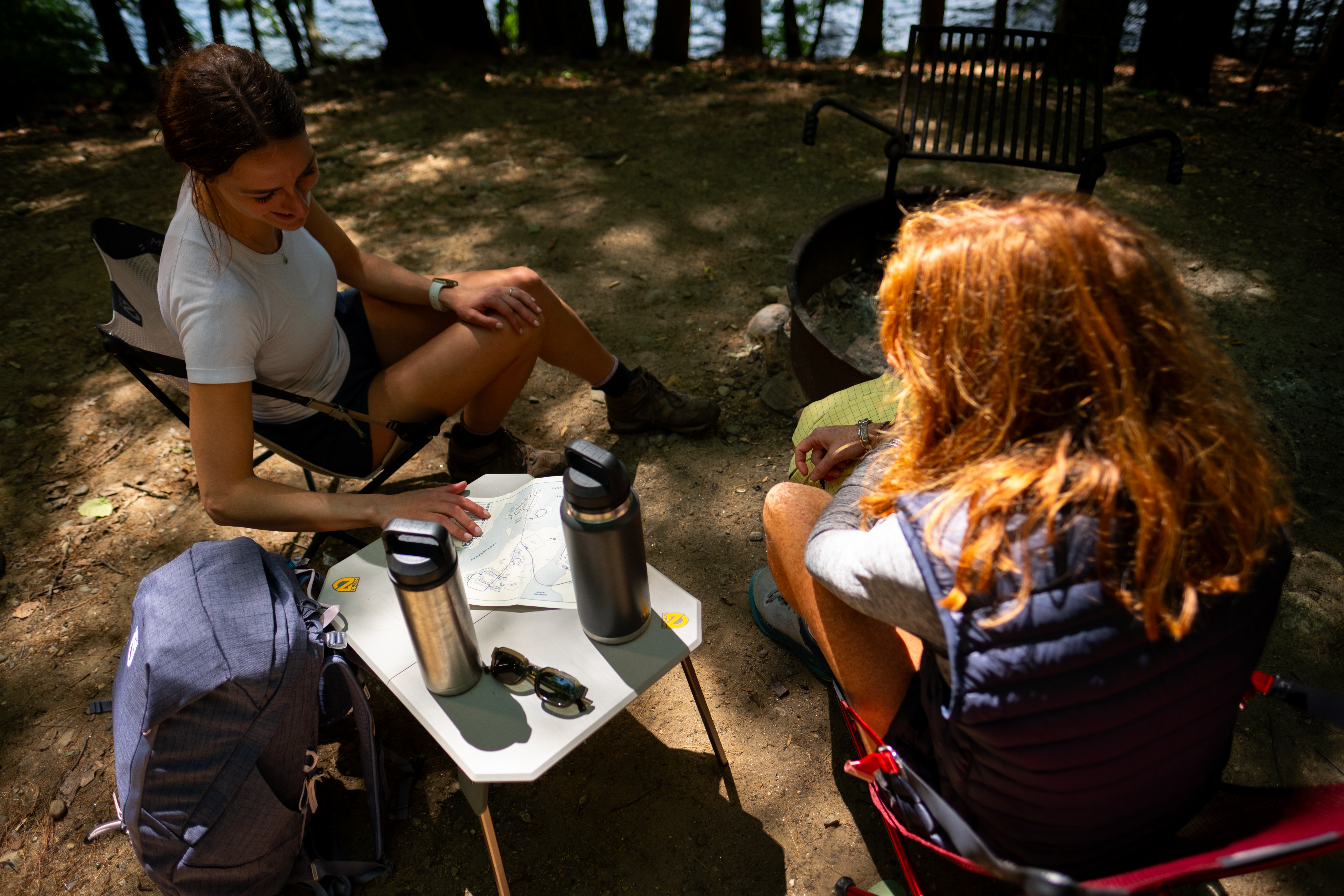 NEMO Moonlander Dual-Height Camp Table in Fog set up at side table height